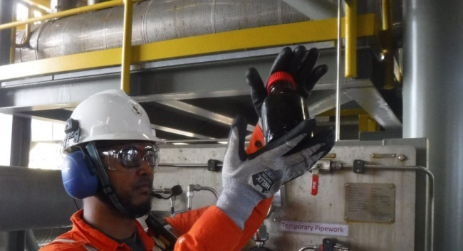 Guyanese, Shivnarine Outar, tested the first sample of Liza Crude produced offshore Guyana in December 2019 at the Liza Phase 1 Development Project.